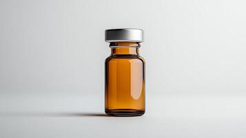 A small bottle of liquid sitting on a table photo
