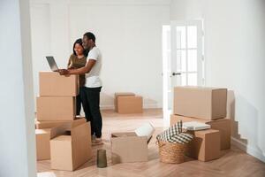 African, American, couple are moving into new house photo