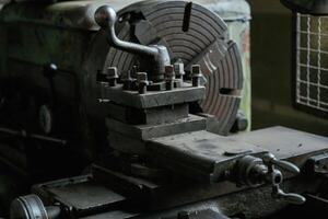 Vintage industrial lathe in an old workshop setting photo