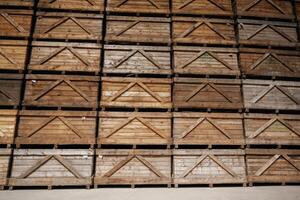 Stacked wooden, crates in an organized warehouse setting photo
