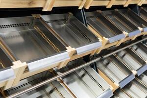 Empty shelves in a supermarket due to stockpiling during a pandemic. photo