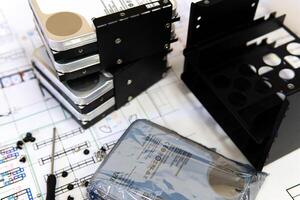 Hard drive and ssd with a screwdriver upgrade and repair the internal parts of a desktop computer, selective focus photo