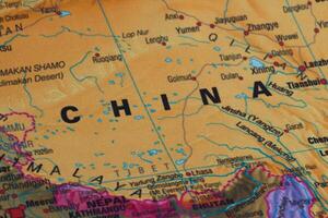 Map view of China on a geographical globe. photo