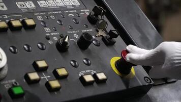 Emergency shutdown button in production.Press the emergency button on cnc machine control panel at factory,concept of prevention before damage of CNC machines video