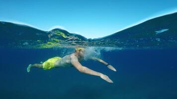 Swimmer Warming Up In The Ocean Water To Get Ready For The Race video