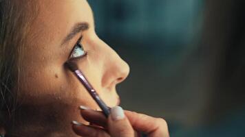 Makeup with an emphasis on lips and eyes to create a bold look for the Slavic girl. A neat hairstyle adds charm and completion video