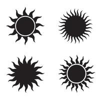 Four stylized black sun silhouettes with various rays and circular central elements against a white background representing solar themes. vector