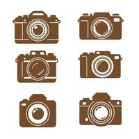 Six stylized illustrations depicting different digital camera designs rendered in a simple brown silhouette against a clean white background for varied applications. vector