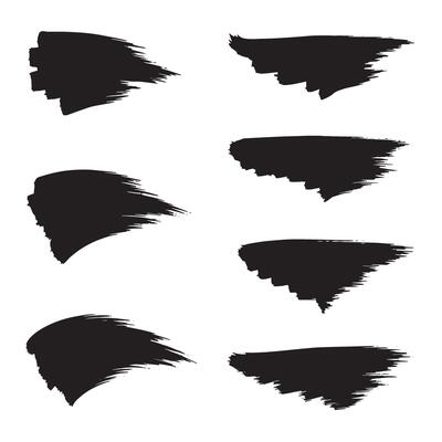 Artistic brush strokes silhouettes in black on white background for design elements