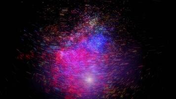 Fast moving multi-colored particles carried by the wind swirl and sparkle in space, twisting into a spiral, creating a tornado. video