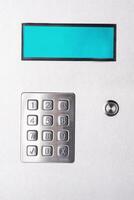 Numeric keypad panel with screen and button photo