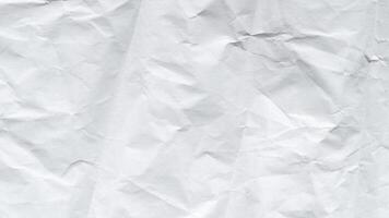 Crumpled paper texture transition seamless wrinkled surface in motion for creative backgrounds. video