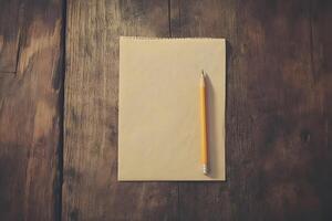 Blank notepad and yellow pencil on rustic wooden table creating a perfect workspace for creative writing, sketching, and brainstorming ideas in a cozy atmosphere photo