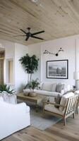 A cozy living room featuring white walls, wooden ceiling, and stylish furniture, creating warm and inviting atmosphere photo