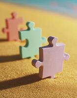 Puzzle pieces on the beach photo