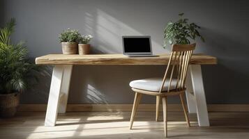 wooden desk with a laptop and chair. with morning light photo