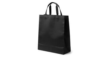 Black paper bag with handles on white background photo