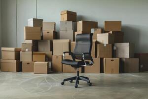 Office chair in front of a pile of boxes photo
