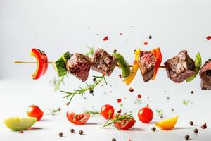 Grilled beef on a skewer with vegetables and herbs photo