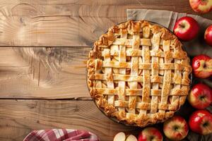 An apple pie with lattice on a wooden table photo