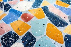 A colorful pattern of tiles on a floor photo