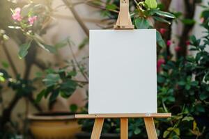 An easel with a blank canvas on it in front of a garden photo