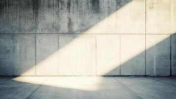 Concrete wall illuminated by diagonal sunlight. Textured, with stark shadows and empty space photo