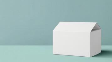 Blank white box mockup on green background photo