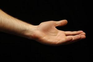 A hand reaching out to the side photo