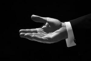 Black and white image of a man's hand photo