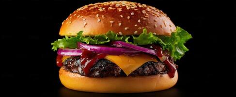 The delicious cheeseburger with fresh toppings on a black background. photo