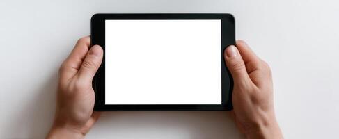 The tablet in hands ready for creative digital content display. photo
