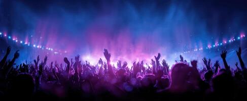 The vibrant crowd immerses in electric atmosphere at a live concert. photo