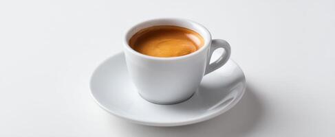 The elegant white espresso cup filled with rich, aromatic coffee. photo