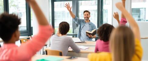 The enthusiastic teacher engaging with students in a modern classroom setting. photo