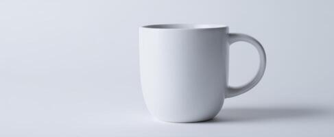 The minimal white mug on a clean, soft background for stylish beverage presentation photo