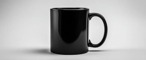The sleek black mug showcasing modern minimalism and elegance. photo