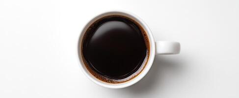 The steaming cup of black coffee on a minimalist surface photo