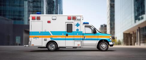 The ambulance parked in an urban environment with modern buildings in the backdrop. photo