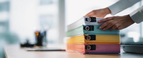 The Organized Binders Showcase in a Modern Office Workspace photo