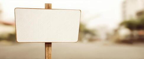 The blank wooden sign inviting creative messages in a serene outdoor setting. photo