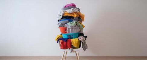 The tall pile of colorful laundry baskets stacked in a modern home. photo