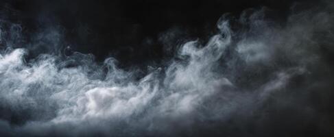 The swirling mist creating an ethereal atmosphere in a dark setting photo