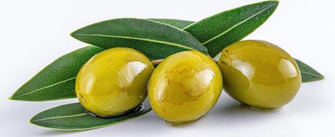 The fresh and vibrant green olives with olive leaves on a white background. photo