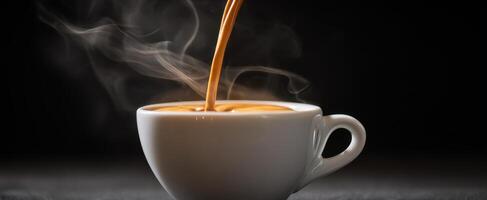 The steam rises as coffee pours into a white cup, creating warmth and comfort. photo