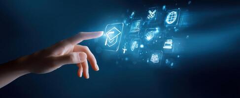 The hand interacting with digital educational icons in a futuristic setting. photo