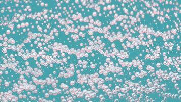 Bubbles are gently floating in a beautiful aqua background that enhances their appearance video