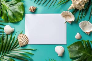 top view composition mockup white blank card with tropical leaves and sea shells on blue background, bright natural lighting photo