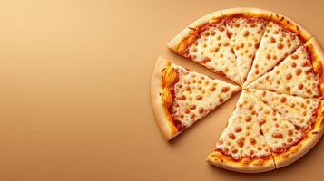 Sliced pizza with melted cheese on orange background, copy space photo