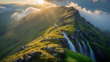 Waterfall Cascading Down Green Mountain Peak with Sunrise Light photo